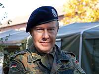 Als Reservist beim Zentrum für Operative Kommunikation der Bundeswehr Porträtbild eines Soldaten mit schwarzem Barett