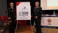 Colonel Piccirillo und General Bohrer präsentieren das offizielle Logo für die 4. CISM World Winter Games 2021