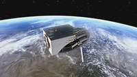 Ein Satellit fliegt in großer Höhe über der Erde