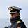 Fregattenkapitän Christian Meister Ein Marineoffizier mit dunkelblauer Arbeitsuniform und weißer Tellermütze.