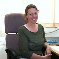 A woman sitting at a desk
