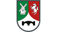 Wappenfarben Grün, Rot und Silbern, darauf silberne Windmühle, aufsteigendes Ross, Pionierbrücke.