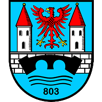 Auf blauem Grund zwei silberne Türme mit roten Dächern, ein roter Adler über einer Pionierbrücke.