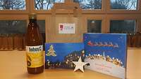 Saft, Süßes, ein Hoffnungsstern und Grüße der Seelenrunde bilden den Inhalt der Weihnachtstüten