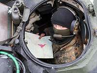 A soldier looking to the camera