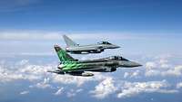 Eurofighter and "Ghost Tiger" together Two Eurofighters of 74 Tactical Air Wing in formation.