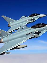 Two Eurofighters fly in close formation In Germany, the alert squadrons each consist of two Eurofighters.