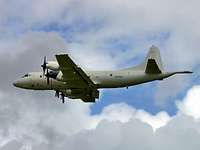 P-3C Orion A grey aircraft in flight.