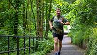 A man running through the woods