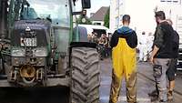 Neben einem Bundeswehr-Traktor stehen drei Männer, im Hintergrund weitere Frauen und Männer