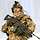 Soldat in Schutzausrüstung mit Gewehr