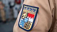 Ein Patch mit bayrischem Wappen und Schriftzug Fregatte Bayern 