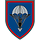 Wappen des Fallschirmjägerregiments 26 Auf blauem Grund mit rotem Rand ist ein grauer Fallschirm, darauf der heilige Michael, der Schutzpatron der Fallschirmjäger.