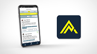 Ein Smartphone auf dem eine App geöffnet ist, rechts daneben das Zeichen für Sammelplatz