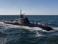 U-Boot U34 Ein aufgetauchtes U-Boot U34 auf offener See