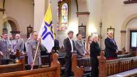 Bundesministerin der Verteidigung Christine Lambrecht und Markus Grübel MdB im Gottesdienst