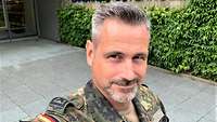 Hauptfeldwebel Michael J. nutzt die USG-Online-App seit November 2021 und ist sehr zufrieden