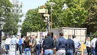 The ASUL defense system being admired by a crowd