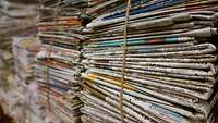 Countless newspaper piles