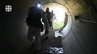 Drei Personen in einen Tunnel