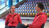 Thumbnail zum Videobeitrag Invictus Games 2023. Zwei Personen sitzen sich gegenüber und sprechen miteinander.