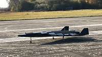 Small unmanned spacecraft on a runway