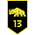 Schwarz-goldenes Wappenschild mit einem gezeichneten Nashorn und den Ziffern 13 in Gold.