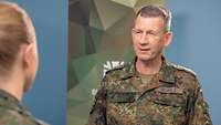 Eine Soldatin steht einem Soldaten während eines Interviews gegenüber.
