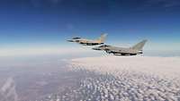 Mission enhanced Air Policing South: a German and an Italian Eurofighter flying together.