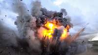 Eine gewaltige Explosion, ein Feuerball und Rauchwolken entstehen. 