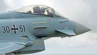 A Eurofighter pilot shows the Heavy Metal sign during a flight – the so-called french fries fork