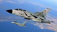 Two jets flying together in an operational formation