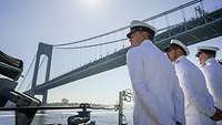 Sailors in white uniform.