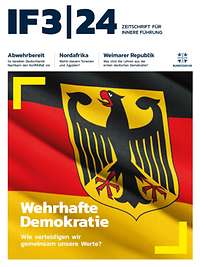 Das Deckblatt der Zeitschrift zeigt eine Bundesflagge und den Schriftzug "Wehrhafte Demokratie"