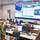 Several military personnel in an operations centre