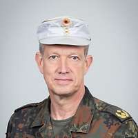 A portrait of Major General Maik Keller, in uniform