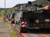 Several Leopard 2 battle tanks drove into the railway wagons