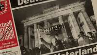 Die Titelseite der Zeitung „Bundeswehr aktuell“ mit Foto von jubelnden Personen am Brandenburger Tor