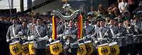  Uniformed musicians from the Bundeswehr are playing during an event.