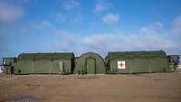 Tent with red cross