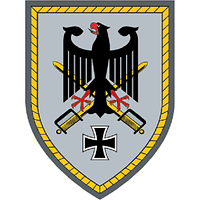 Two crossed swords are set on a grey field. The Federal Eagle is superimposed and the Iron Cross centred below.