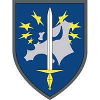 The crest features a map of Europe in grey and a sword, encircled by golden stars, against a blue background.